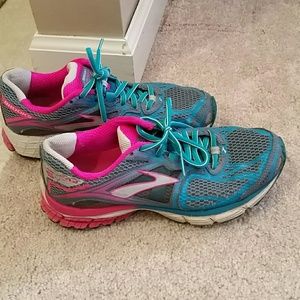 Well worn Brooks running shoes